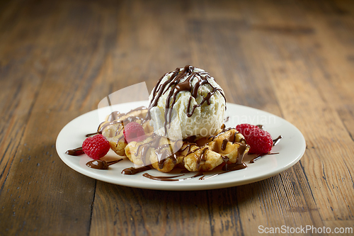 Image of plate of belgian waffle with ice cream