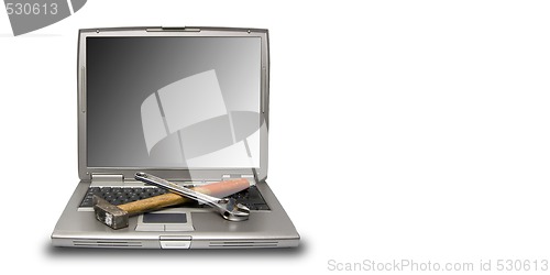 Image of laptop and tools