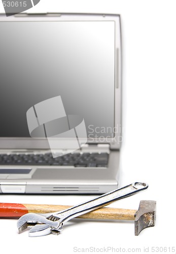 Image of laptop and tools