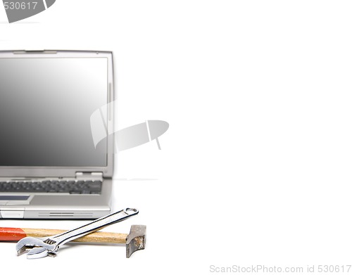 Image of laptop and tools