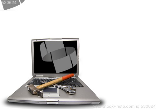 Image of laptop and tools