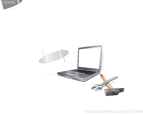 Image of laptop and tools