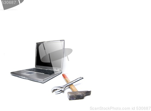 Image of laptop and tools