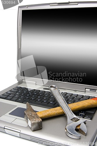 Image of laptop and tools