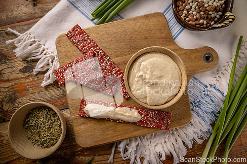 Image of Top view of bowl of hummus