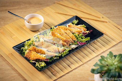 Image of Breaded chicken strips