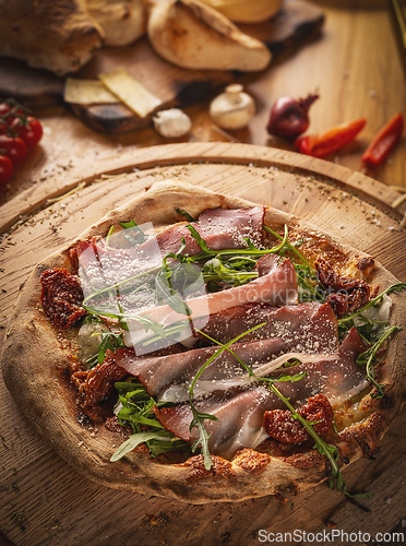 Image of Gourmet Italian prosciutto pizza