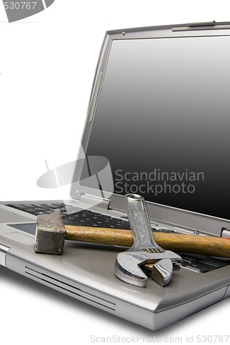 Image of laptop and tools