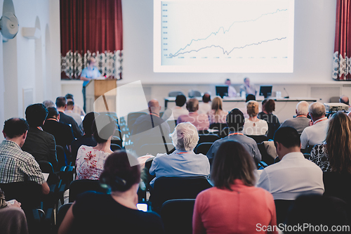 Image of Speaker at Business Conference and Presentation.
