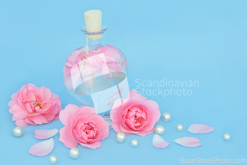 Image of Rosewater for Skincare with Pink Rose Flowers
