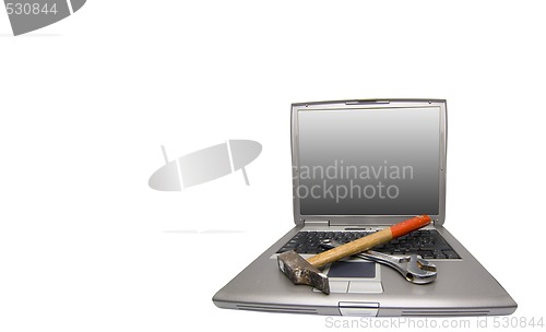 Image of laptop and tools