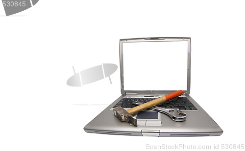 Image of laptop and tools