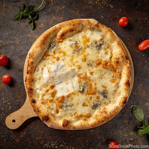 Image of Delicious four cheese pizza