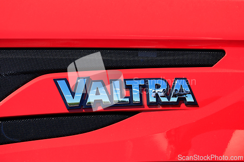 Image of Logo Valtra on Red Valtra Tractor