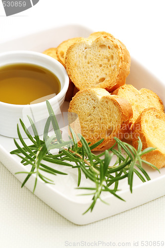 Image of baguette and olive oil