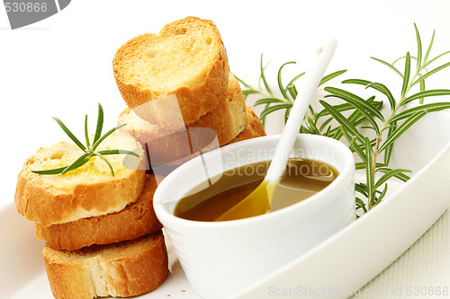 Image of baguette and olive oil