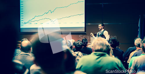 Image of Business speaker giving a talk at business conference meeting event.