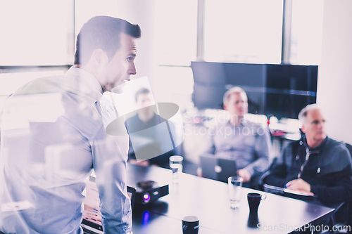 Image of Manager giving business presentation on corporate meeting event.