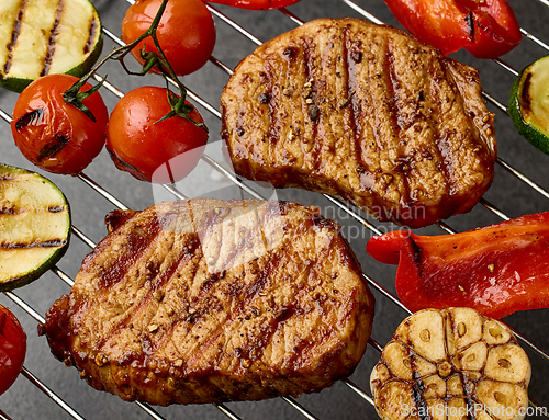 Image of freshly grilled steaks