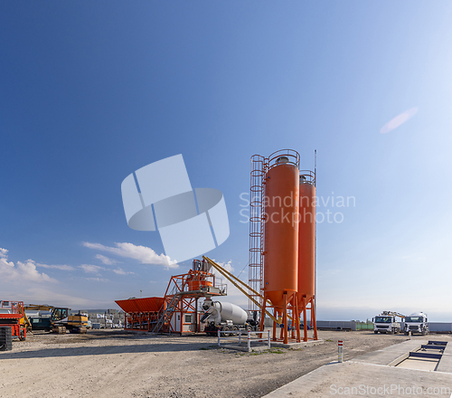 Image of Concrete mixing plant with truck