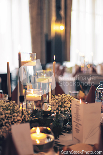 Image of Decorated tables and modern lighting