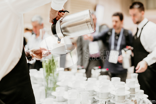 Image of Coffee break at conference meeting. Business and entrepreneurship concept