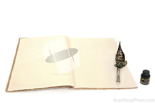 Image of Retro Writing Equipment with Quill Pen Ink and Notebook 
