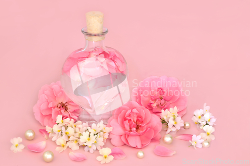 Image of Rose and Nemesia Flower Perfume in Heart Shaped Bottle