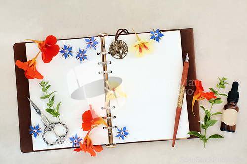Image of Preparing Herbs and Flowers for Cold and Flu Remedy