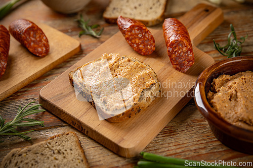 Image of Sausage spread on a slice of bread