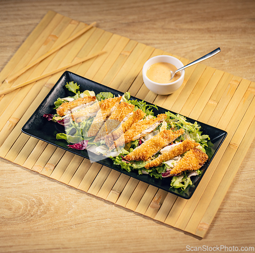Image of Asian style breaded chicken strips