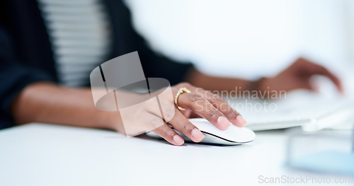 Image of Hand, mouse and business woman in office with finance research for corporate tax return planning. Technology, accounting career and female financial consultant working on computer in workplace.