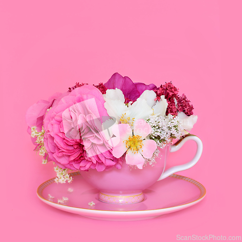 Image of Summer Flower Arrangement in Pink Tea Cup for Herbal Tea