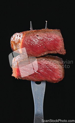 Image of Freshly grilled pieces of beef steak 