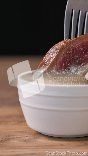 Image of grilled piece of sliced beef steak 