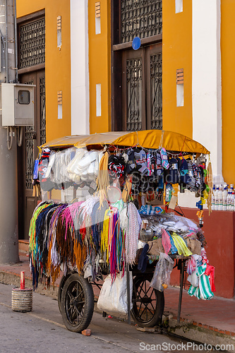 Image of Street market in Santa Marta bursts with pre-loved clothes. Santa Marta Colombia