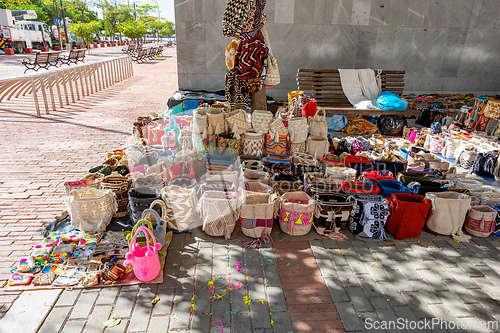 Image of Colorful handmade bags at a vibrant street market. Santa Marta, Colombia