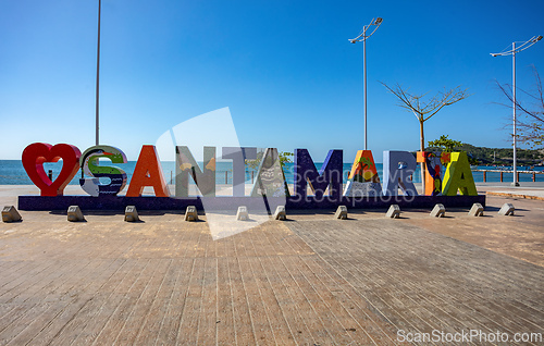 Image of Santa Marta sign with the Caribbean Sea in the background. Colombia