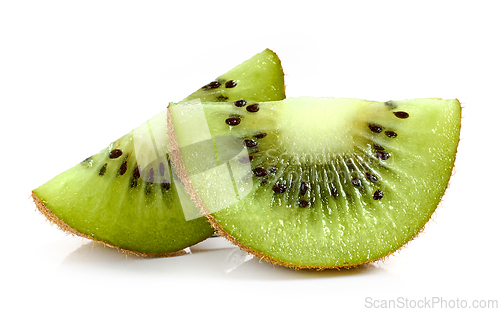 Image of kiwi slices on white background