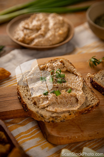Image of Slice of bread with greaves