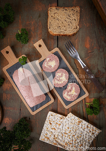 Image of Sliced ham pate roll with eggs