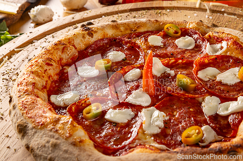 Image of Close-up view of hot pepperoni pizza