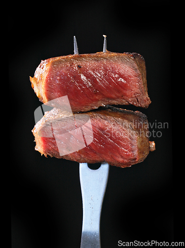 Image of Freshly grilled pieces of beef steak 