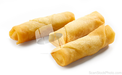 Image of fried springrolls on white background