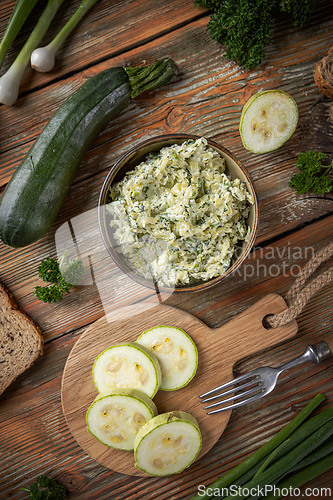 Image of Bowl of delicious zucchini cream cheese