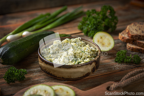 Image of Zucchini salad is surrounded by fresh zucchini,
