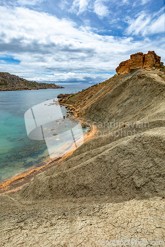 Image of Ghajn Tuffieha Bay and Qarraba Bay with red sand. Malta