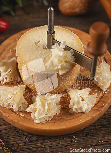 Image of Cheese sliced with special knife