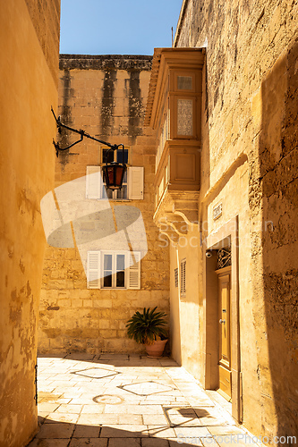 Image of Traditional Maltese house, with colorful doors and flowers. Mdina Malta
