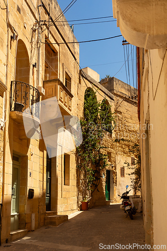 Image of Traditional Maltese house, with colorful doors and flowers. Mdina Malta